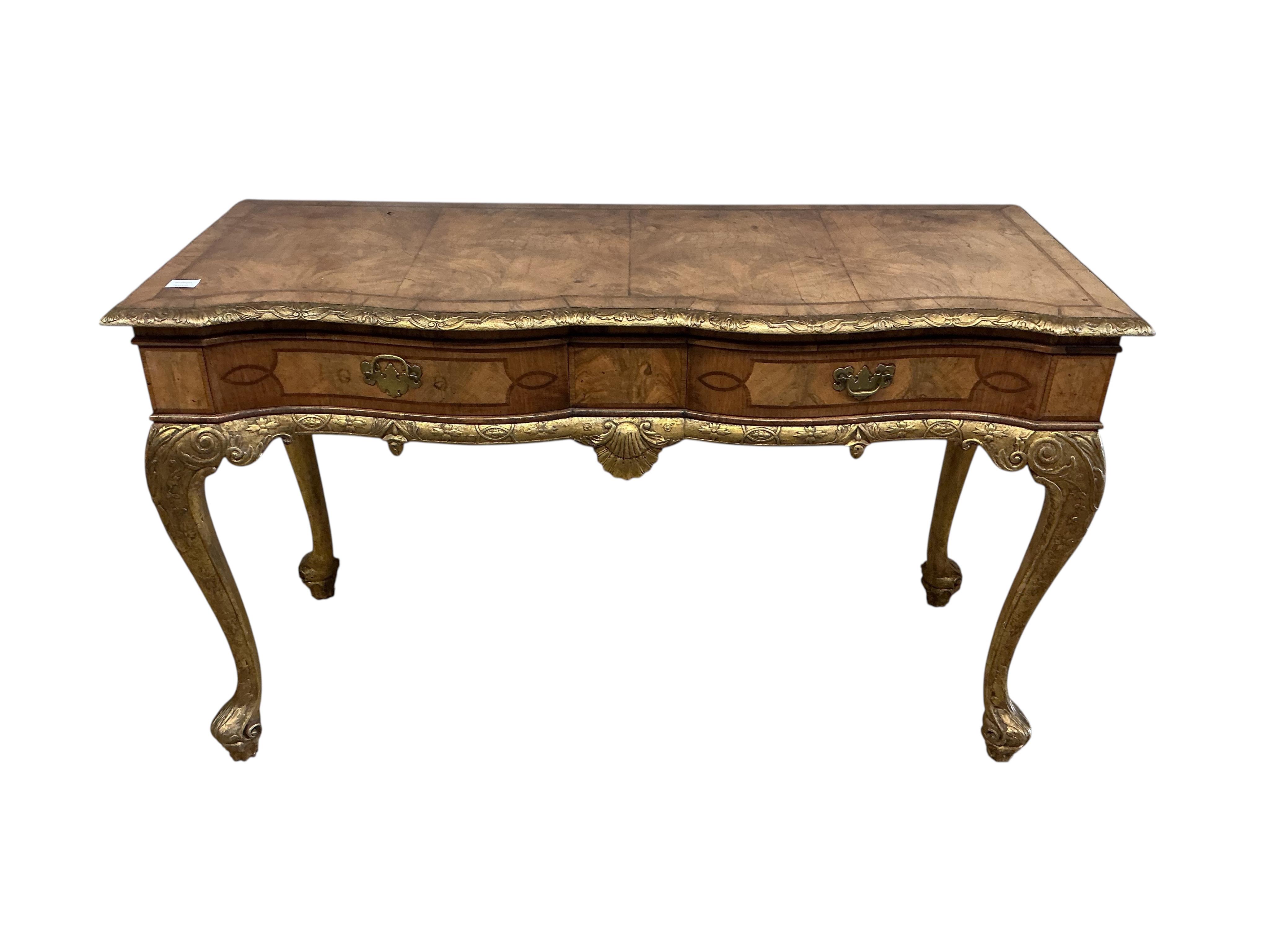 A George I style parcelgilt walnut two drawer serving table, width 137cm, depth 54cm, height 82cm